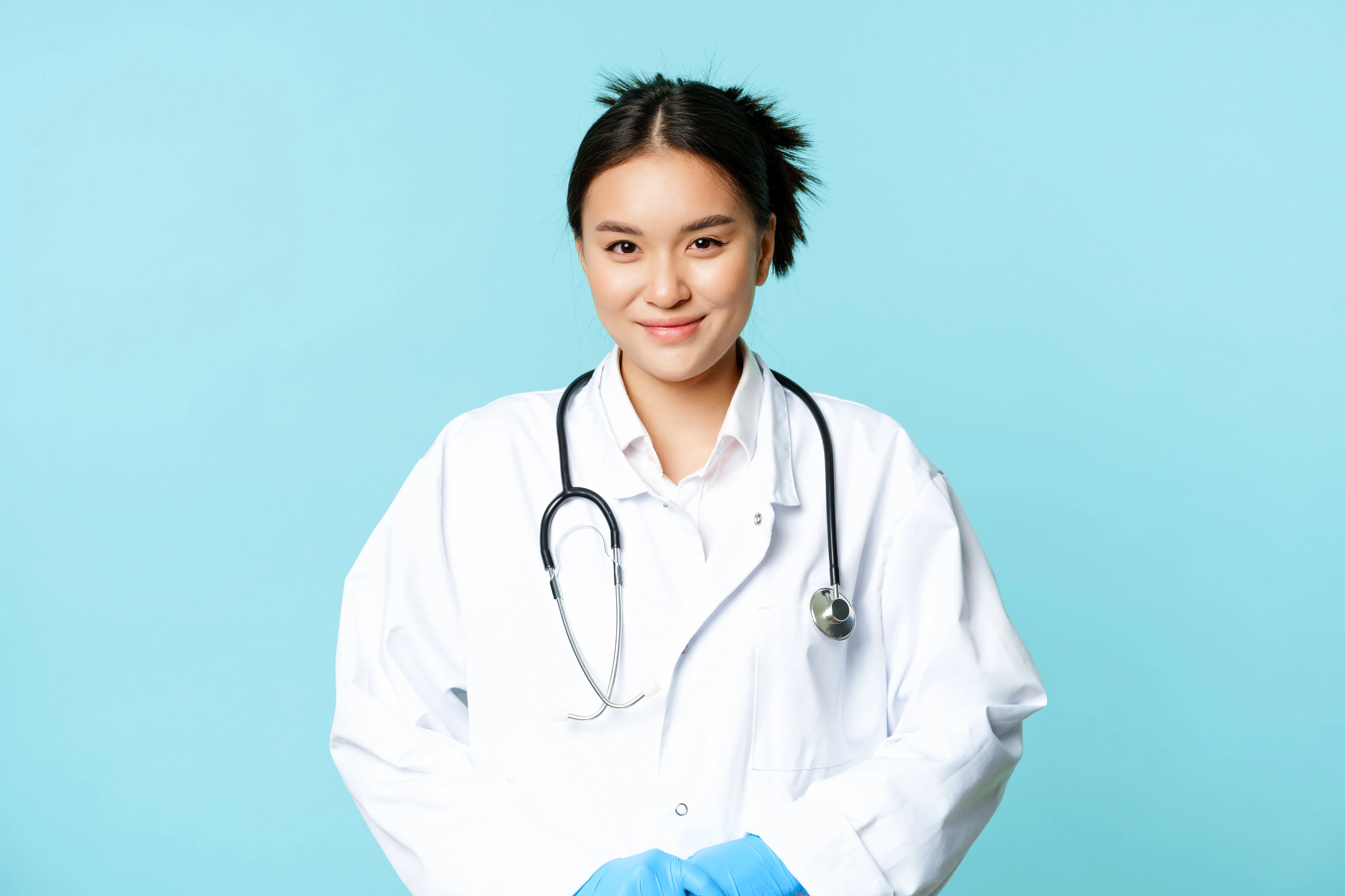 files/healthcare-medical-concept-smiling-asian-female-doctor-hospital-uniform-stethoscope-looki.webp